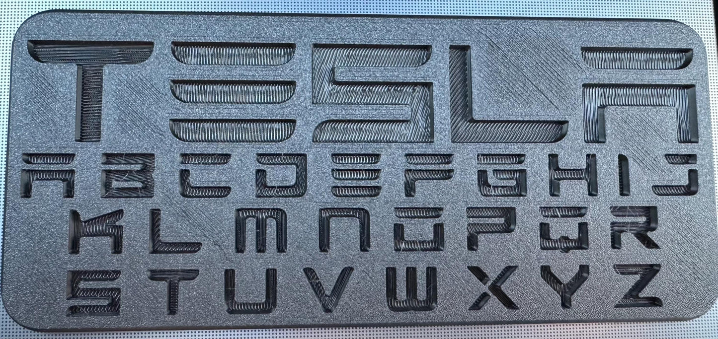 Embossed TESLA Sample & Custom Lettering Sample